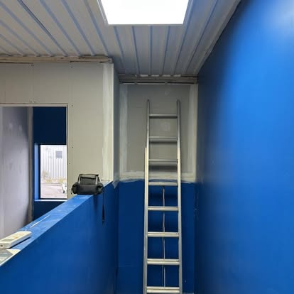 Professional scaffolding setup for high ceiling painting project in Ottawa